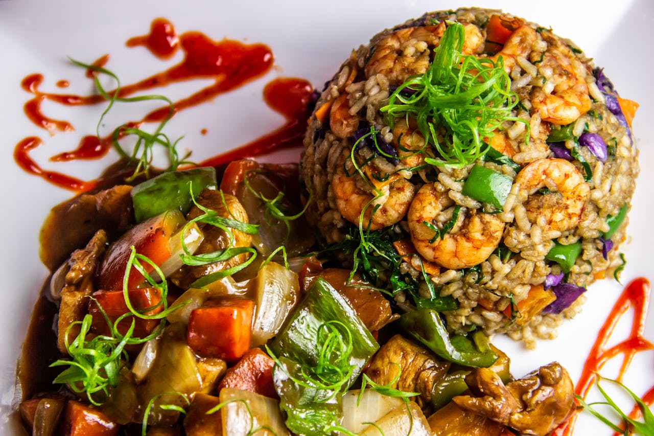 A vibrant Brazilian shrimp risotto with colorful vegetables, perfect for gourmet dining.